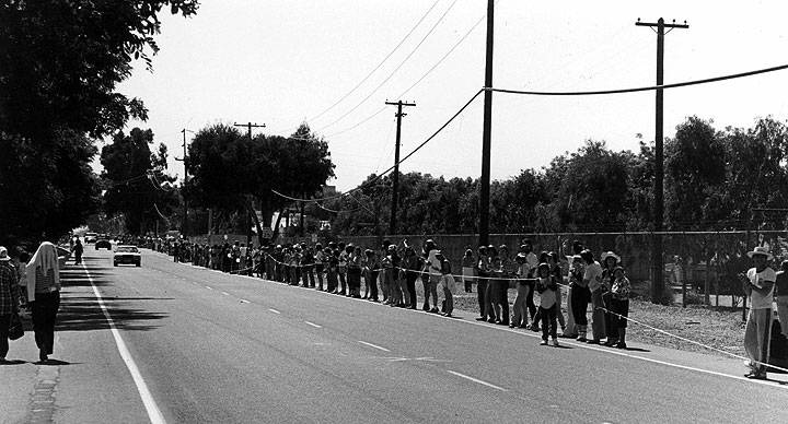 LLL-marchers-with-string-on-road.jpg