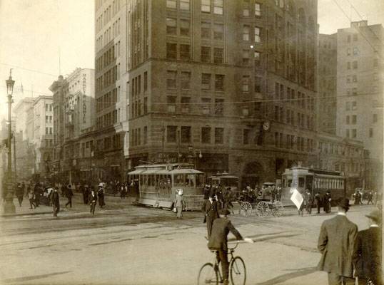 Market and kearny 1909 w bicyclist AAB-6218.jpg