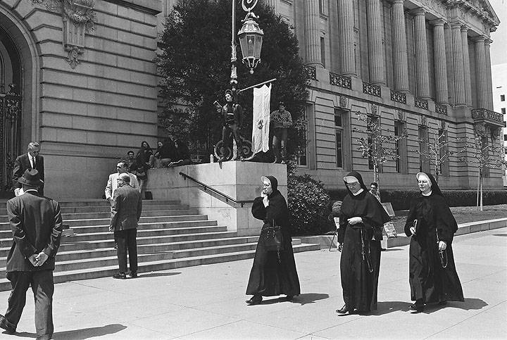 Hells-Angel-reads-behind-nuns-at-City-Hall 00010009 Chuck-Gould.jpg