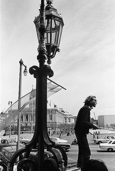 Peter-Berg-reading-from-side-of-City-Hall-looking-east 00010028 Chuck-Gould.jpg