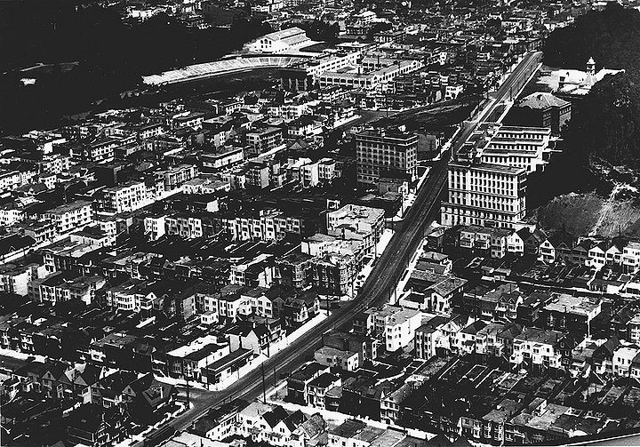 Parnassus-Heiughts-and-Kezar-stadium-northeast-from-6th-and-Judah-at-bottom-Sept-6-1927.jpg